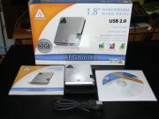The Apricorn USB drive, with box and accessories.